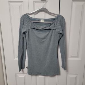 Blue Buttercup sweater shirt with cut out opening